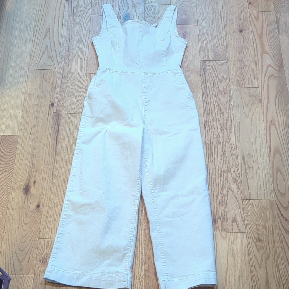 DD77. White Denim Peekaboo Tie Back Jumpsuit. Size XS.